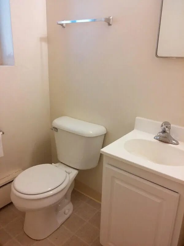 Toilet sink cabinet and towel bar bathroom at Campus East in Milwaukee Student Accommodation