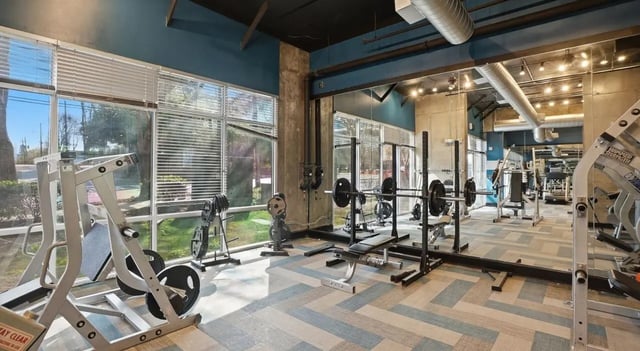 Weight machines racks and benches gym at 1016 Lofts in Atlanta Student Accommodation