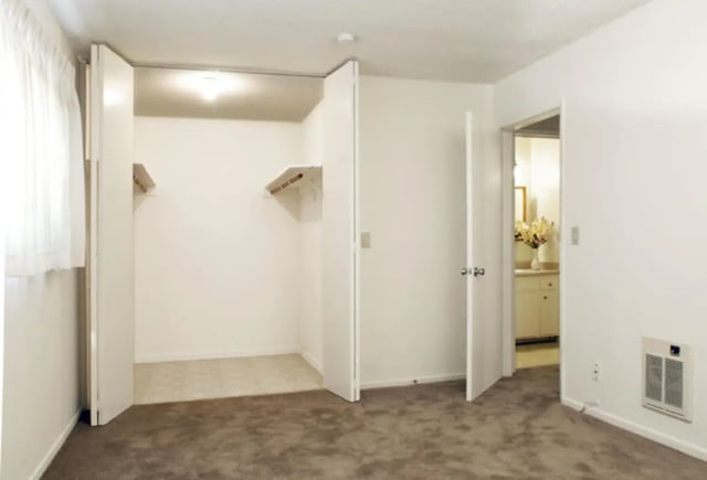 Closet with shelves and vanity beyond Bedroom at Berkshire Terrace in Goleta Student Accommodation