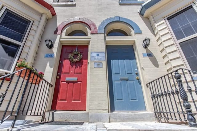 Two doors red blue wreath exterior at Campus Apartments Philadelphia in Philadelphia Student Accommodation