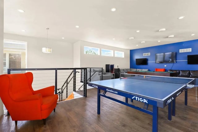 Ping pong table couch and TVs Recreation Area at Alpine Flats (NOW UNIVERSITY LANDING) in Logan Student Accommodation