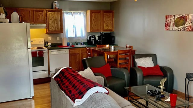 Kitchen with dining area and living space living room at Big Green Properties in Huntington Student Accommodation