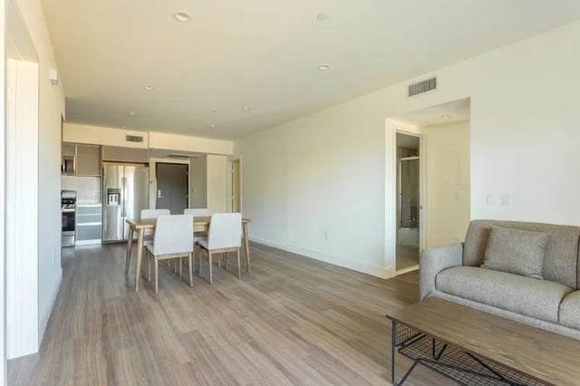 Kitchen dining area living room bathroom suite at 1025 Berendo Villas in Los Angeles Student Accommodation