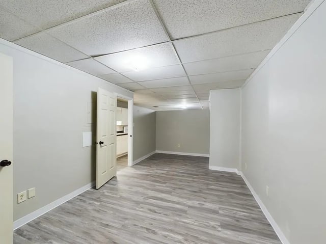 Open door into apartment kitchen and living space. at Beacon Hill Apartments in Muncie Student Accommodation