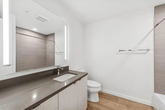 Sink toilet large mirror towel bar bathroom at Alta Peak in Portland Student Accommodation