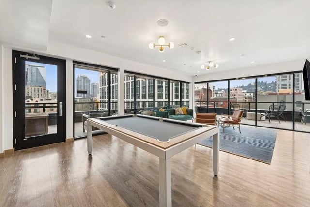 Pool table seating area with city view living room at Alta Peak in Portland Student Accommodation