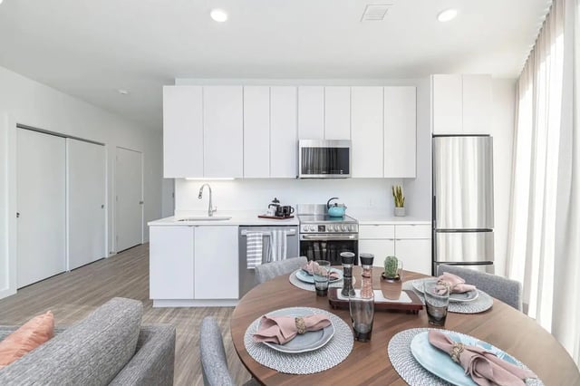 Modern kitchen with dining table and sofa kitchen at 11 East Pleasant in Amherst Student Accommodation