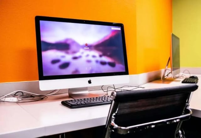 Computer and chair study area at Bear Village Apartments in Springfield Student Accommodation