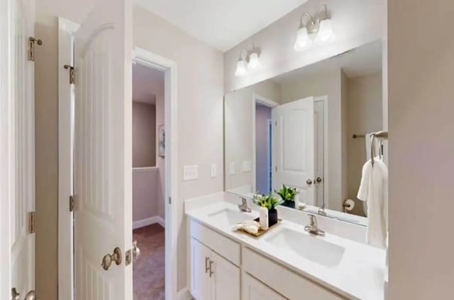 Double vanity mirror and towel rack bathroom at 11 at Main in Winterville Student Accommodation