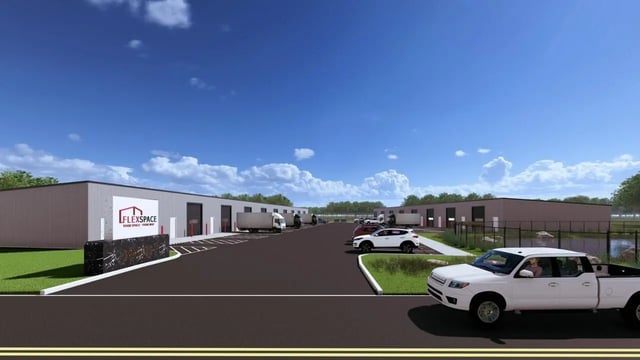 Commercial buildings trucks cars parking exterior at 11 at Main in Winterville Student Accommodation