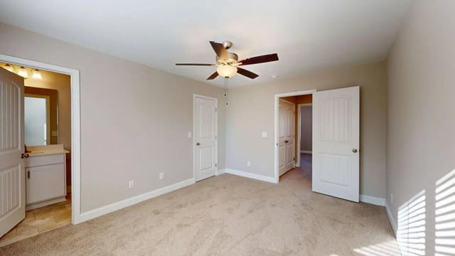 Ceiling fan, two doors, bathroom vanity Bedroom at 11 at Main in Winterville Student Accommodation