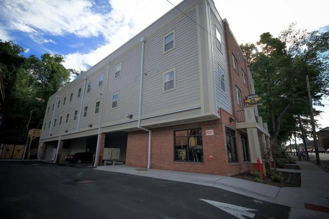 Modern building brick and siding apartments exterior at 494 Lofts in Boone Student Accommodation