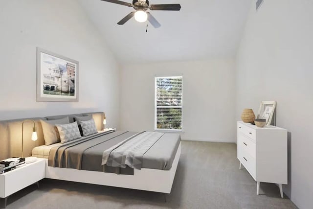Bed dresser window ceiling fan bedroom at Beau Chene Condominiums, Inc in Baton Rouge Student Accommodation