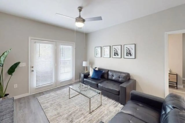 Black leather sofa glass coffee table living room at Altura Student Living in Tallahassee Student Accommodation