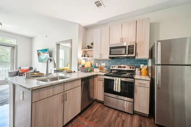 Kitchen with modern appliances and island Image Type Kitchen at Catalyst in Atlanta Student Accommodation