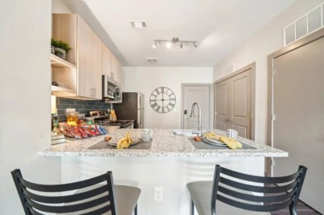 Kitchen counter with snacks and sink kitchen at Catalyst in Atlanta Student Accommodation