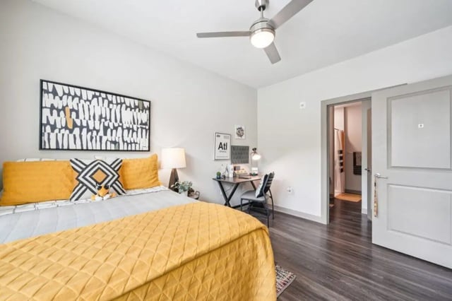 Bed desk art and ceiling fan bedroom at Catalyst in Atlanta Student Accommodation