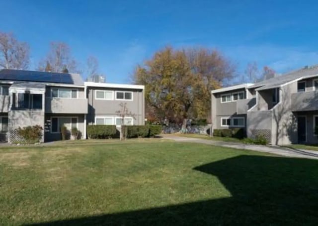 Apartment buildings with solar panels exterior at Aggie Square Apartments in Davis Student Accommodation