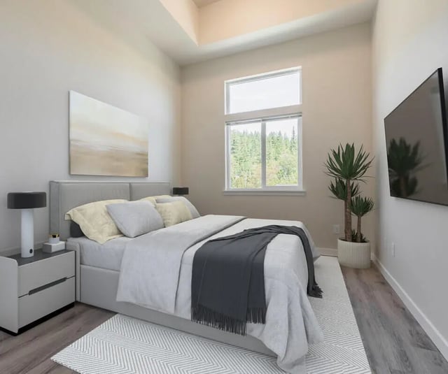 Bed nightstand artwork and TV bedroom at 500 Square Apartments in Bellingham Student Accommodation
