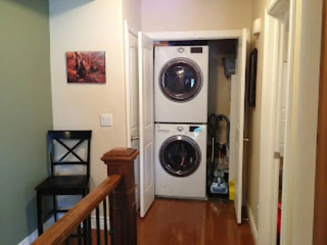 Stacked washer dryer and vacuum laundry area at City Creek Manor in Salt Lake City Student Accommodation