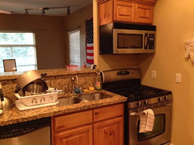 Sink with drying rack and microwave kitchen at City Creek Manor in Salt Lake City Student Accommodation
