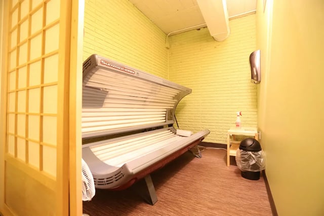 Tanning bed and fan in room Tanning area at Collegiate Communities in West Lafayette Student Accommodation