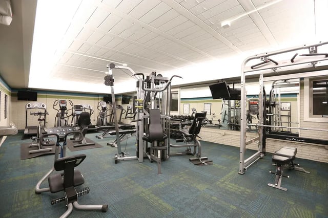 Gym equipment treadmill stationary bikes weight machine gym at Collegiate Communities in West Lafayette Student Accommodation