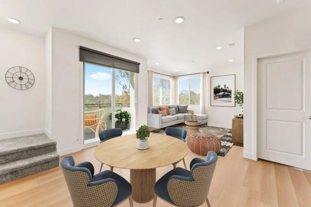 Dining table with chairs living area exterior living room at Ascent at Campus of Life in San Diego Student Accommodation