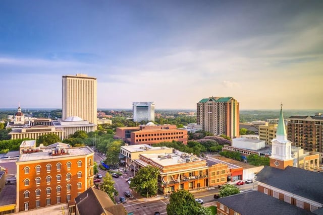 City skyline with buildings and church exterior at Ashburn Hills Townhomes in Tallahassee Student Accommodation