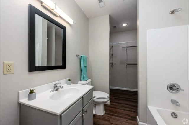 Sink toilet closet shelving shower tub bathroom at 120 Flats in West Lafayette Student Accommodation