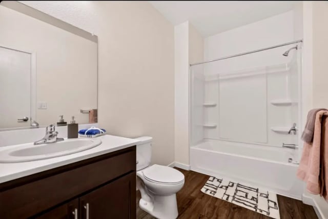 Sink toilet shower tub white bathroom mat Bathroom at Cedar Flats Apartments in Chico Student Accommodation