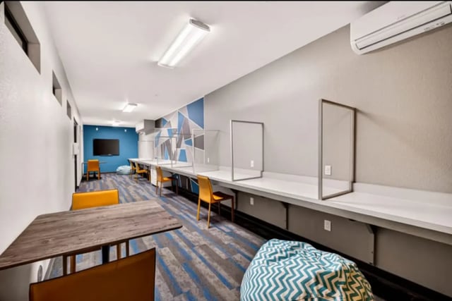 Desks chairs screens bean bag study area at Cedar Flats Apartments in Chico Student Accommodation