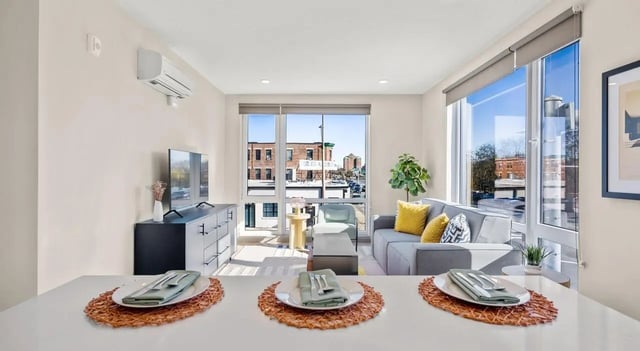 Sofa tv air conditioning table dining living room at 525 Linc in Boston Student Accommodation