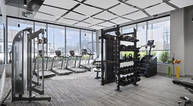 Treadmills weight rack and gym equipment gym area at 525 Linc in Boston Student Accommodation