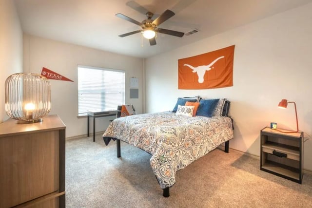 Bed desk lamp Texas flag bedroom at Villas on 26th in Austin Student Accommodation