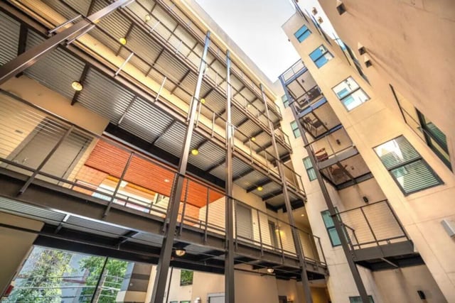 Modern apartment building balconies and exterior. Exterior at Villas on 26th in Austin Student Accommodation