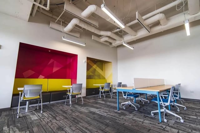 Desks chairs booths modern collaborative study area at UnionWest Student Living in Orlando Student Accommodation