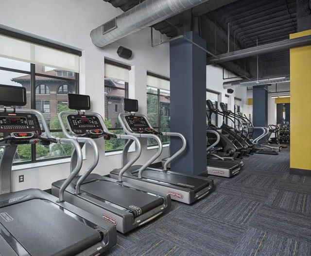 Treadmills and exercise machines gym equipment. at Vic Village North in Ann Arbor Student Accommodation