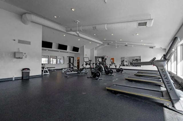 Treadmills ellipticals and rowing machines gym at The Grove at Mankato in Mankato Student Accommodation