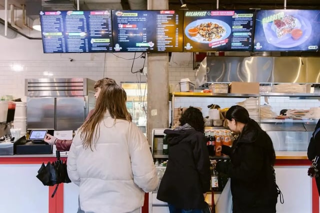 Digital menus with food items customers selecting drinks kitchen Image at The Douglas - Student Housing Apartments in Seattle Student Accommodation