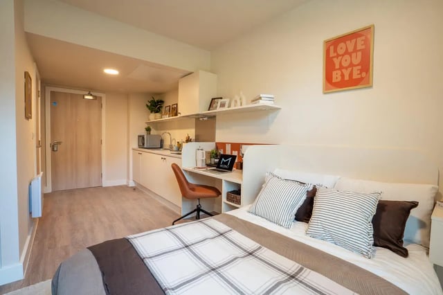 Bed kitchen desk area and bedroom at Valerian in York Student Accommodation