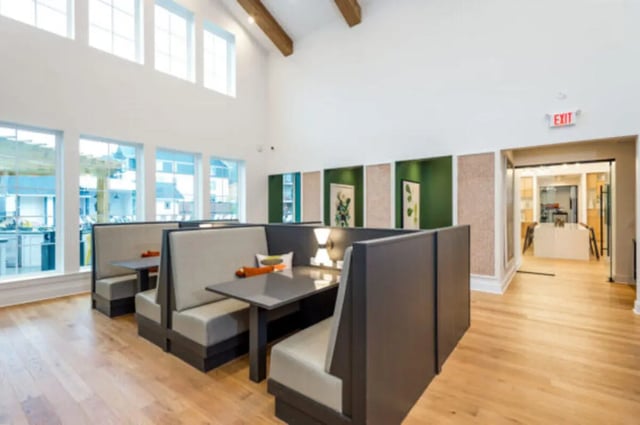 Booth seating with tables and artwork dining area at The Husk and The Helm in Cullowhee Student Accommodation