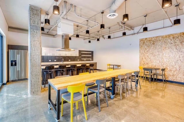 Large kitchen island with chairs and dining tables kitchen at Stateside in Bellingham Student Accommodation
