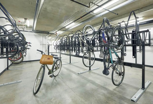 Bicycles parked in racks with basket Image Area at Stateside in Bellingham Student Accommodation