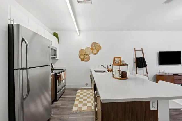 Stainless steel appliances modern kitchen counter kitchen at Slate at 901 in Knoxville Student Accommodation