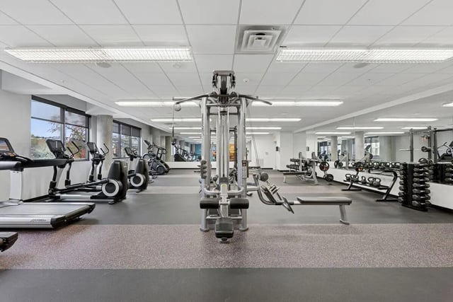 Weight machines treadmills elliptical gym fitness area at Slate at 901 in Knoxville Student Accommodation