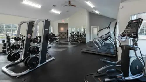 Weight rack treadmills elliptical gym equipment fitness center at Maison Burbank in Baton Rouge Student Accommodation