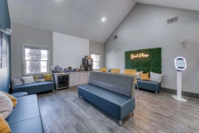 Lounge seating coffee bar photo booth living room at Copper Beech Townhomes in Clovis Student Accommodation
