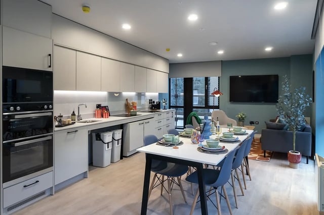Modern kitchen with dining and living area. at Queen Street Place in Galway Student Accommodation