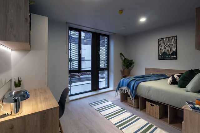 Bed desk and storage unit bedroom at Queen Street Place in Galway Student Accommodation